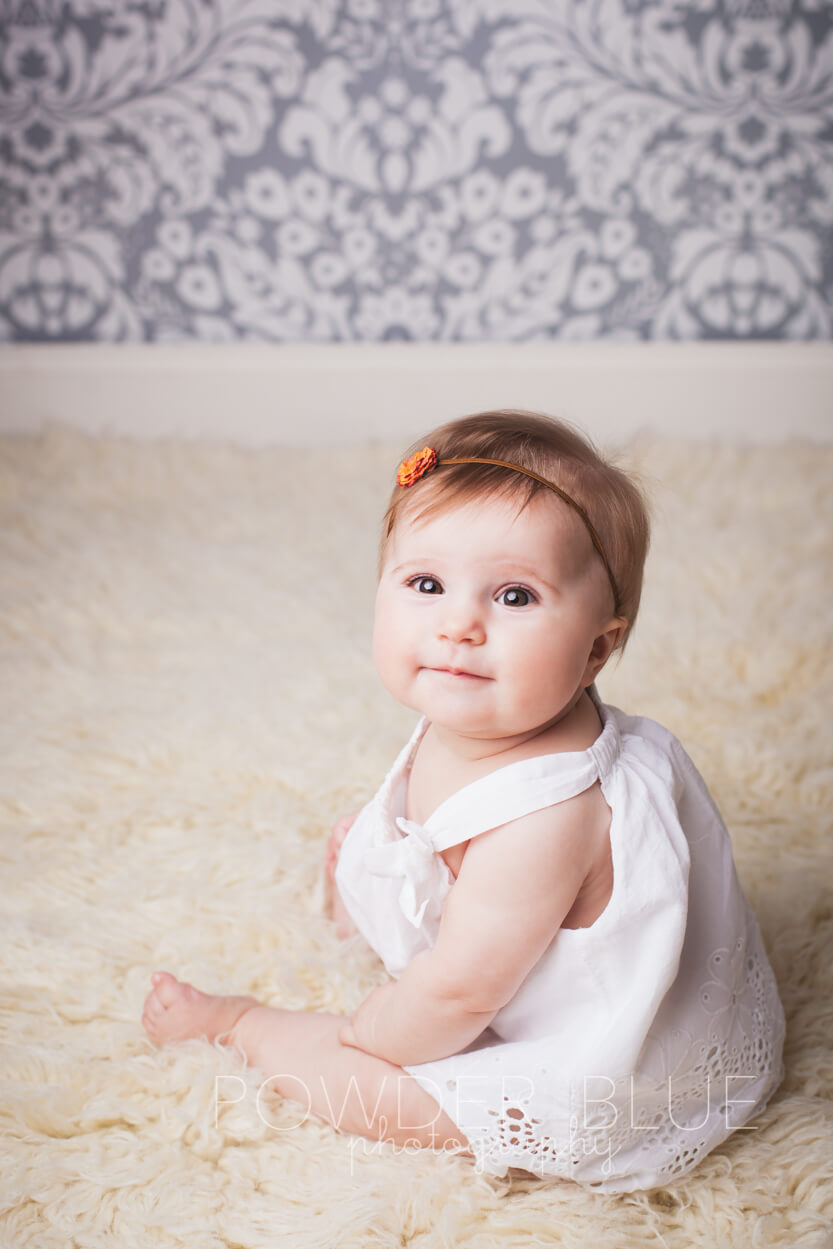 7 month old baby wearing a headband