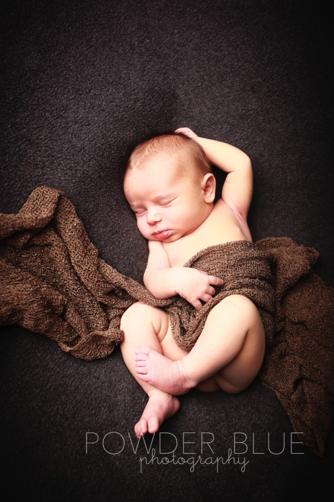 pittsburgh newborn baby sleeping with brown blanket