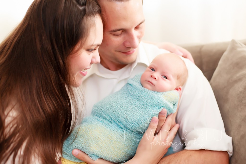 newborn baby and family 4 weeks old