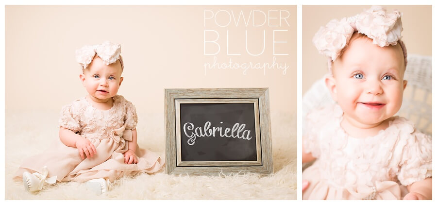 9 month old baby girl studio portrait with cream flokati run and eggnog seamless backdrop and chalkboard composite