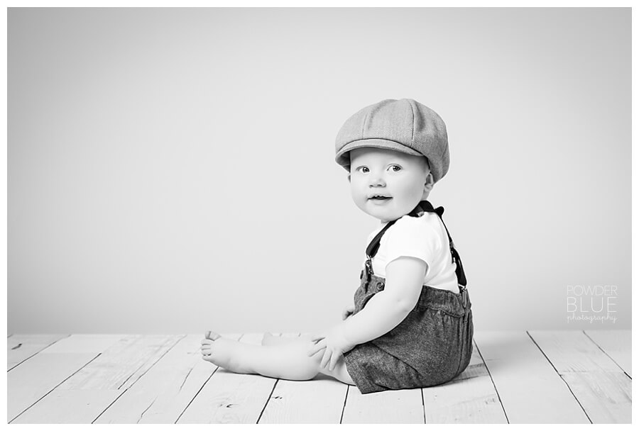 pittsburgh baby portrait in studio with slate grey seamless savage backdrop.