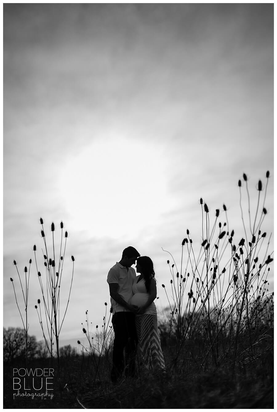 maternity portrait on location tall grassy fields and backlighting golden hour pittsburgh silhouette