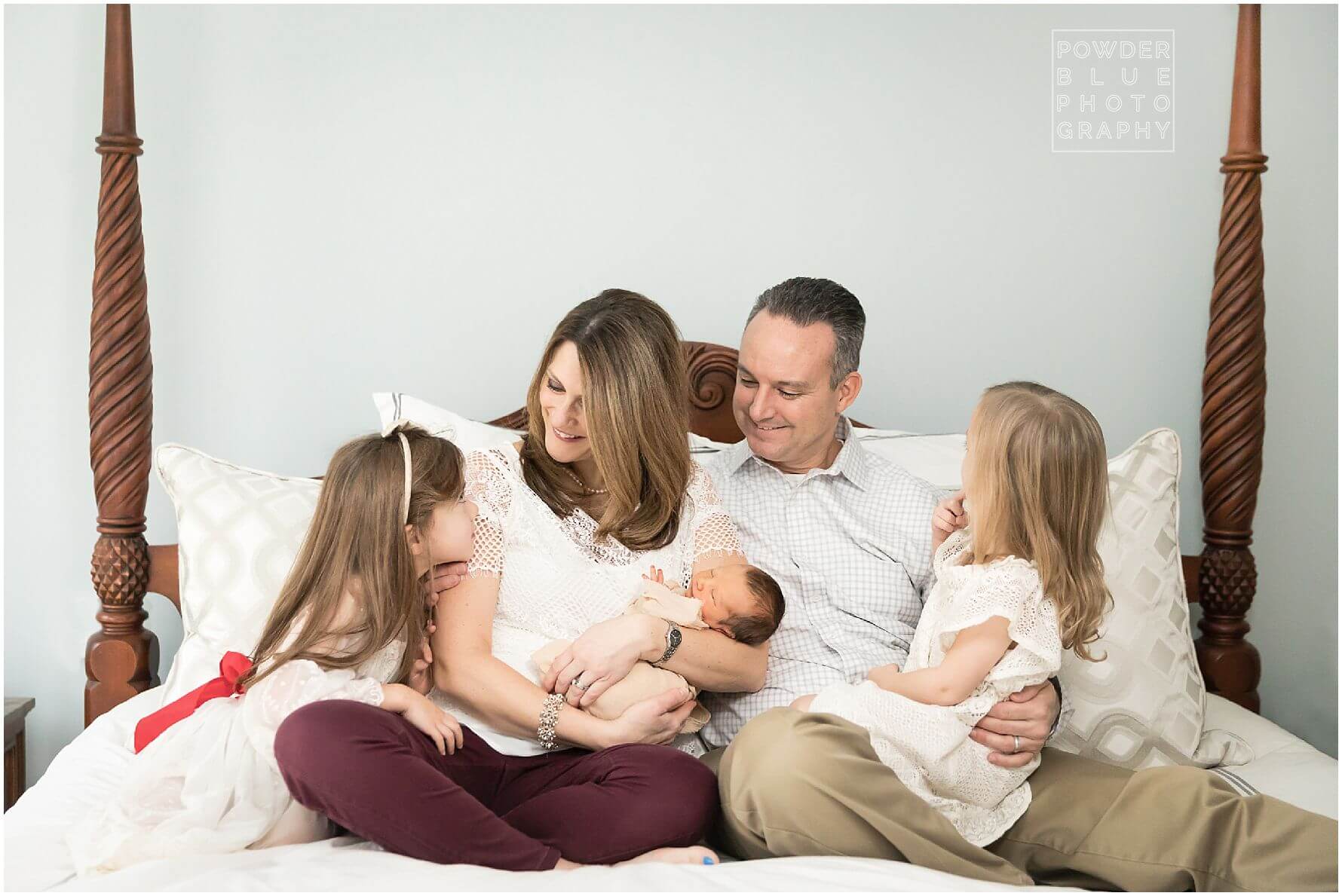 lifestyle newborn photographer missy timko photographed this family of five enjoying their newborn baby boy.