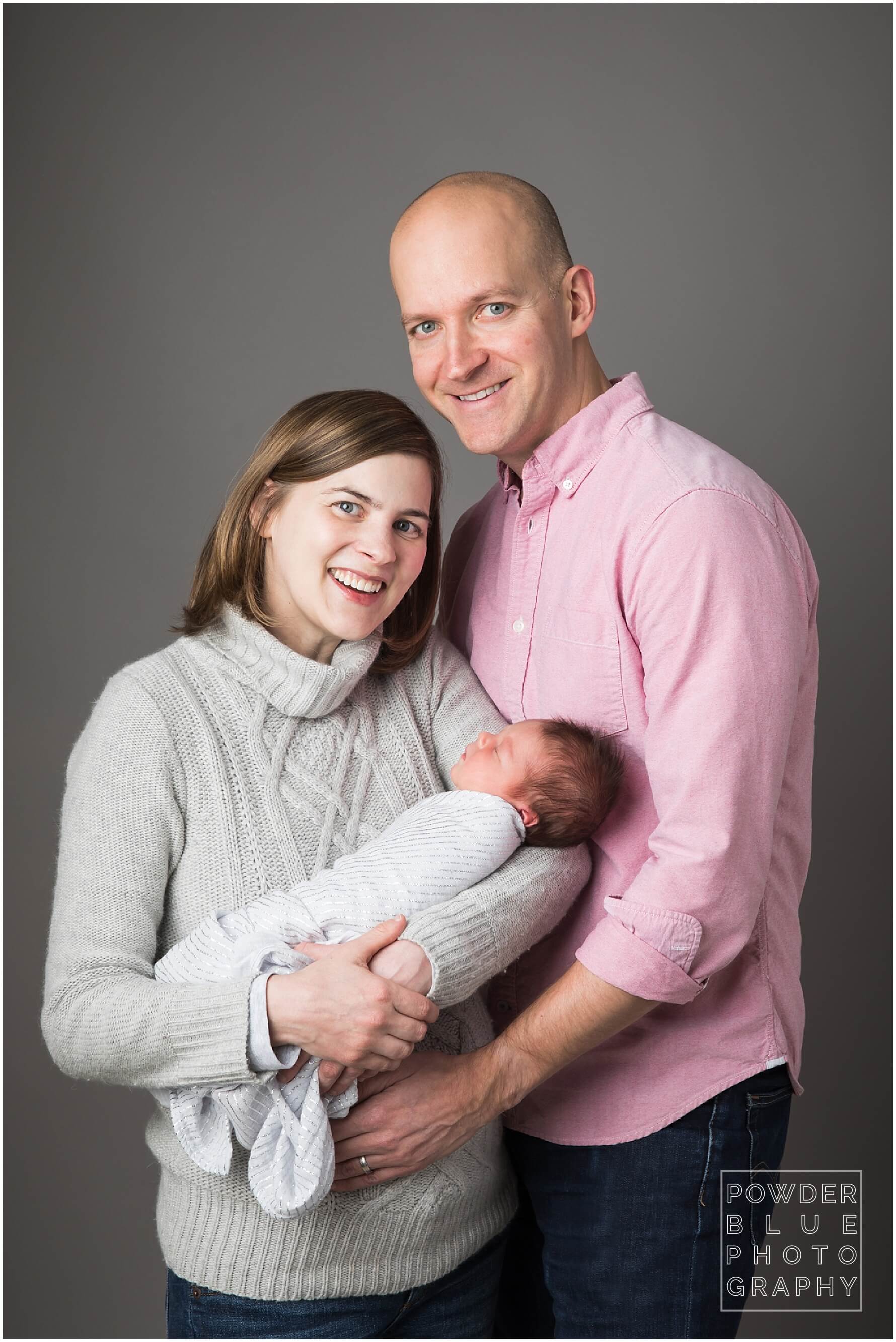 pittsburgh newborn photographer. simple, natural newborn portrait in studio on a white backdrop. baby girl. no props.