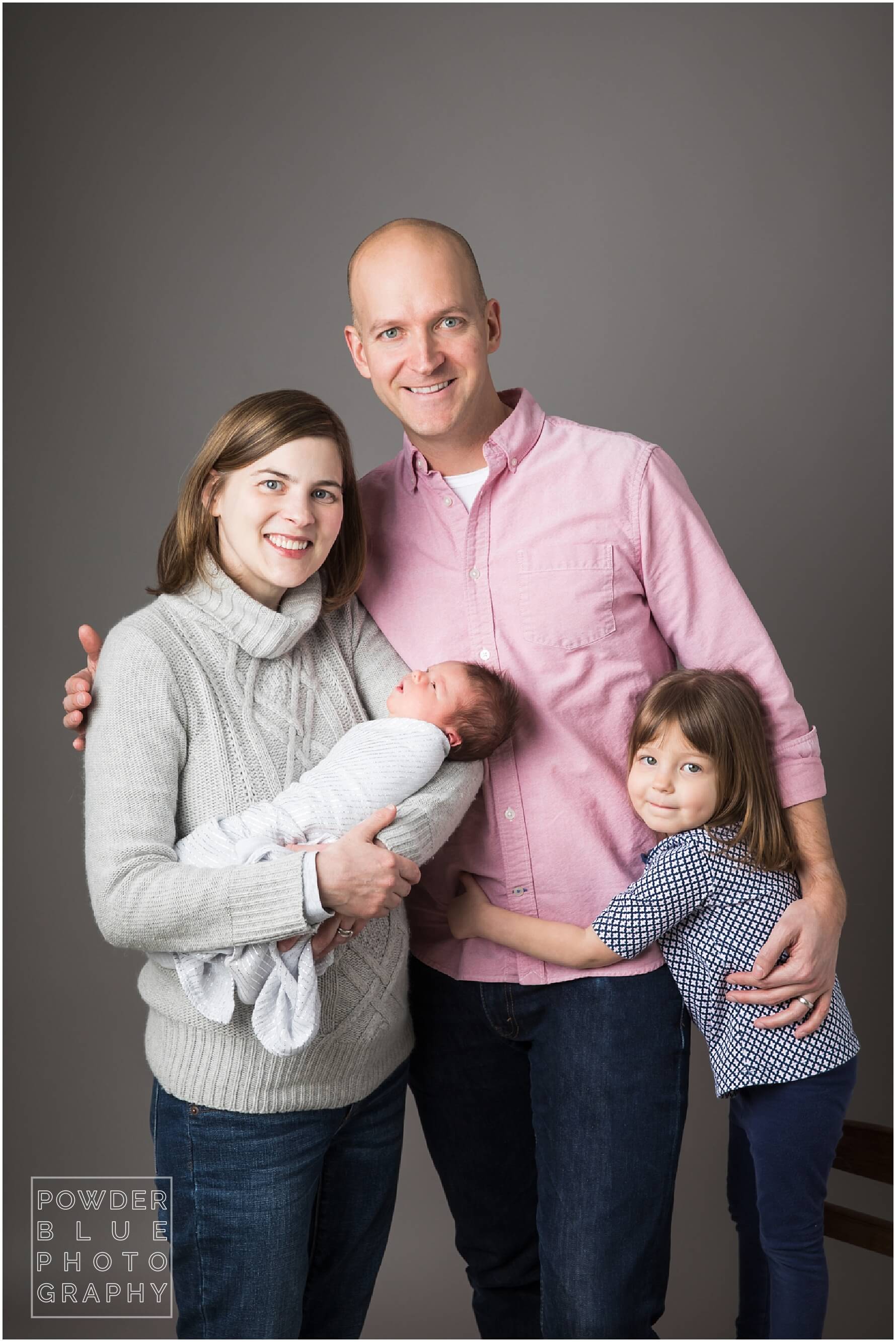 pittsburgh newborn photographer. simple, natural newborn portrait in studio on a white backdrop. baby girl. no props.