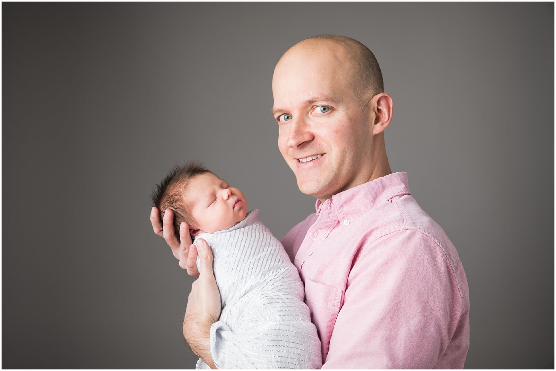 pittsburgh newborn photographer. simple, natural newborn portrait in studio on a white backdrop. baby girl. no props.