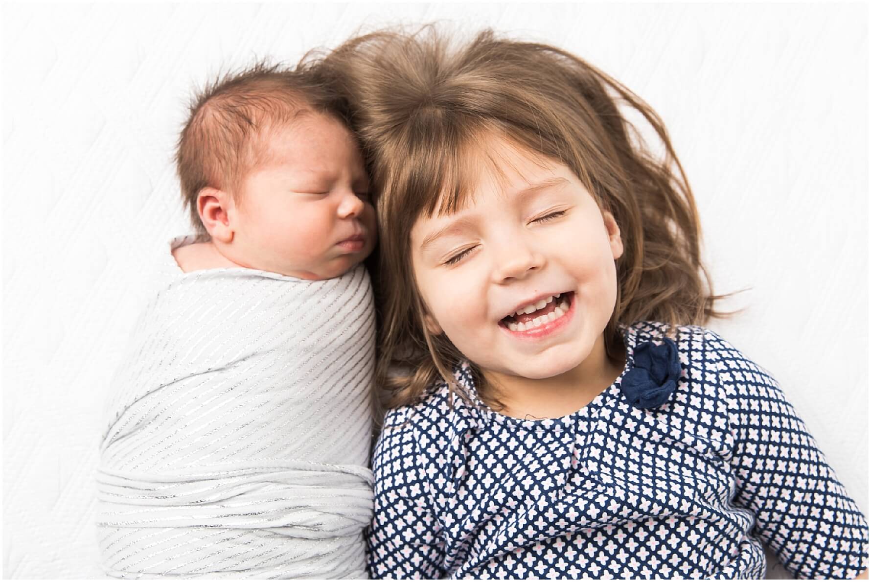 pittsburgh newborn photographer. simple, natural newborn portrait in studio on a white backdrop. baby girl. no props.