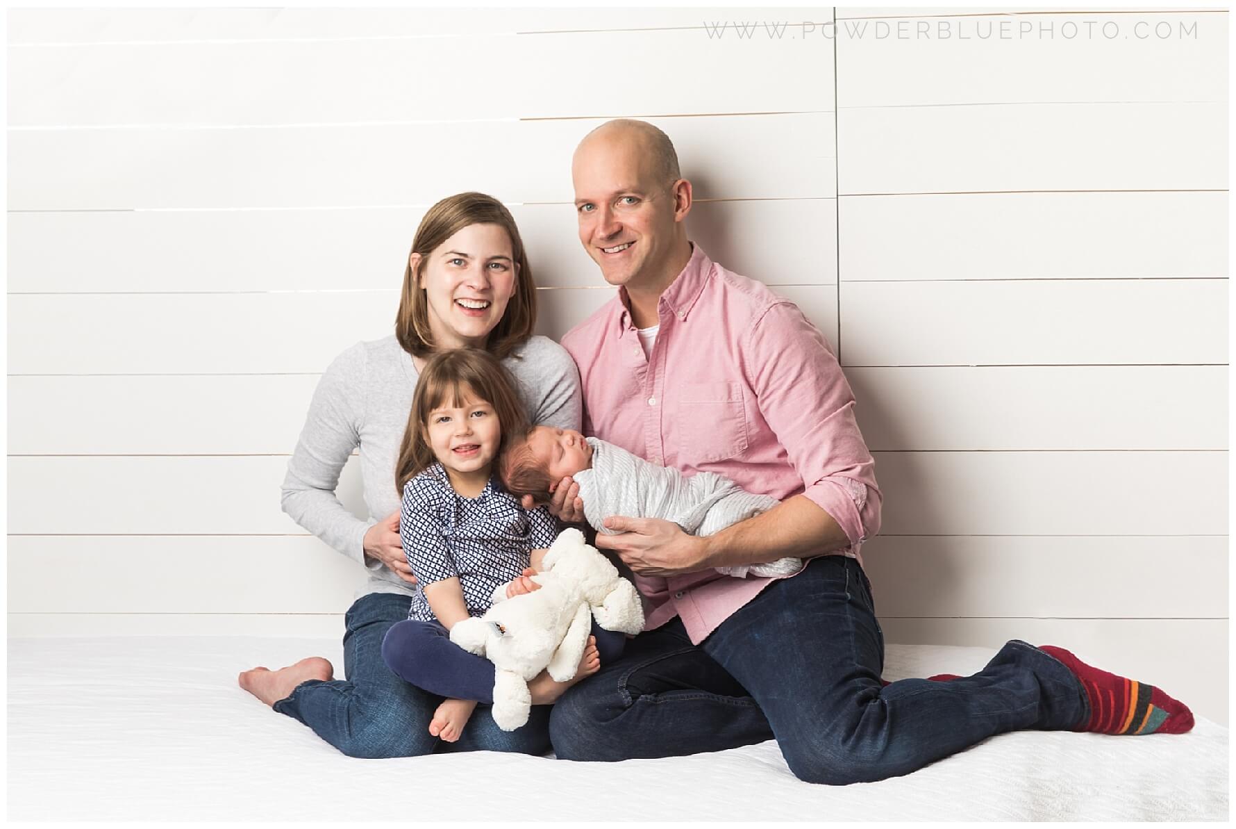 pittsburgh newborn photographer. simple, natural newborn portrait in studio on a white backdrop. baby girl. no props.